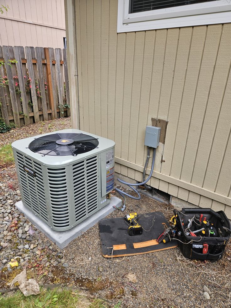 Outdoor air conditioning condenser prepared for routine maintenance